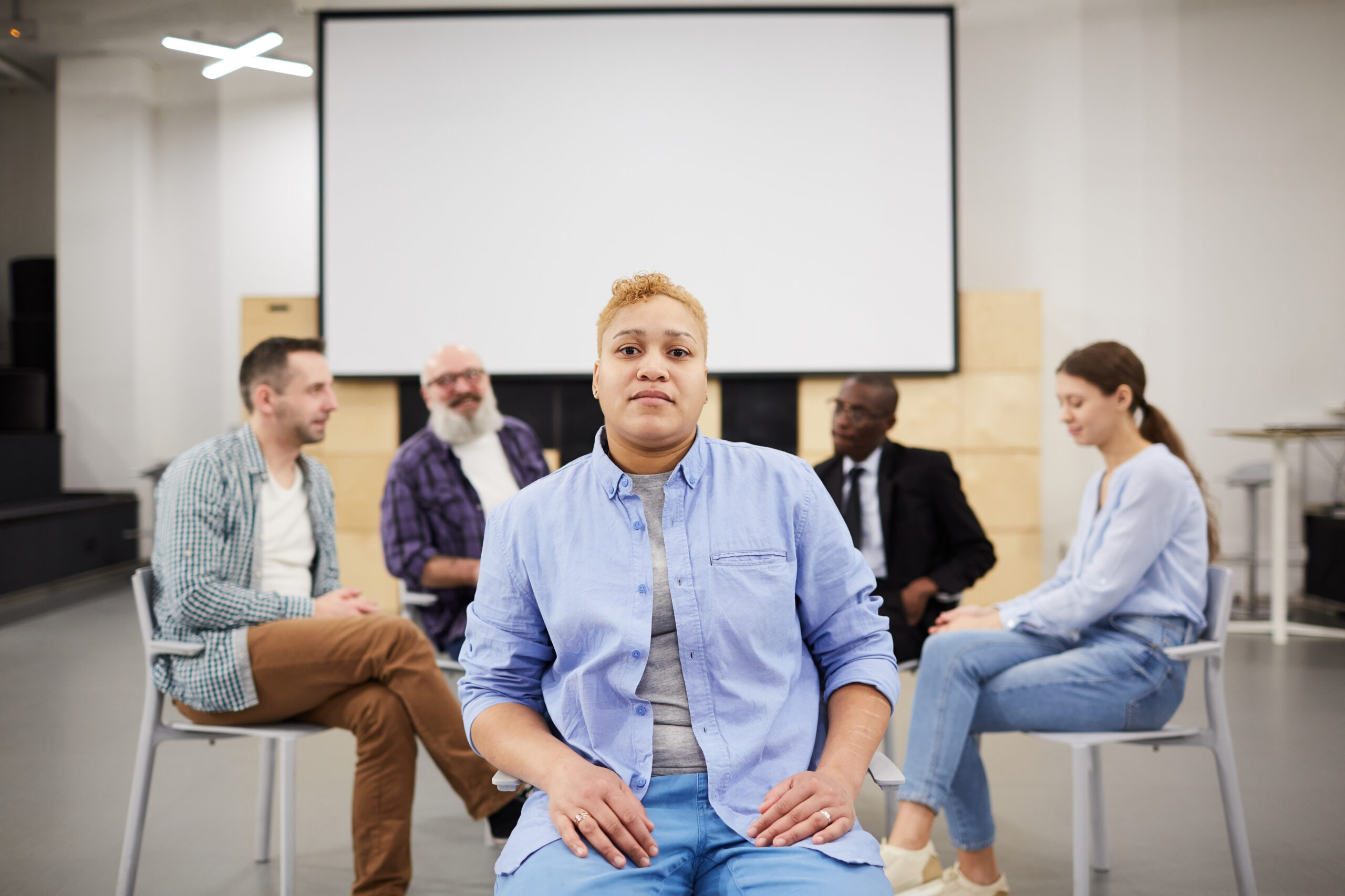 Woman Posing in Group Therapy